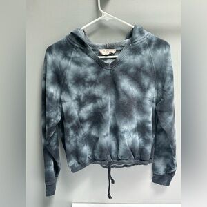 Grayish black and blue tie dye shirt with hood and draw string around the waist